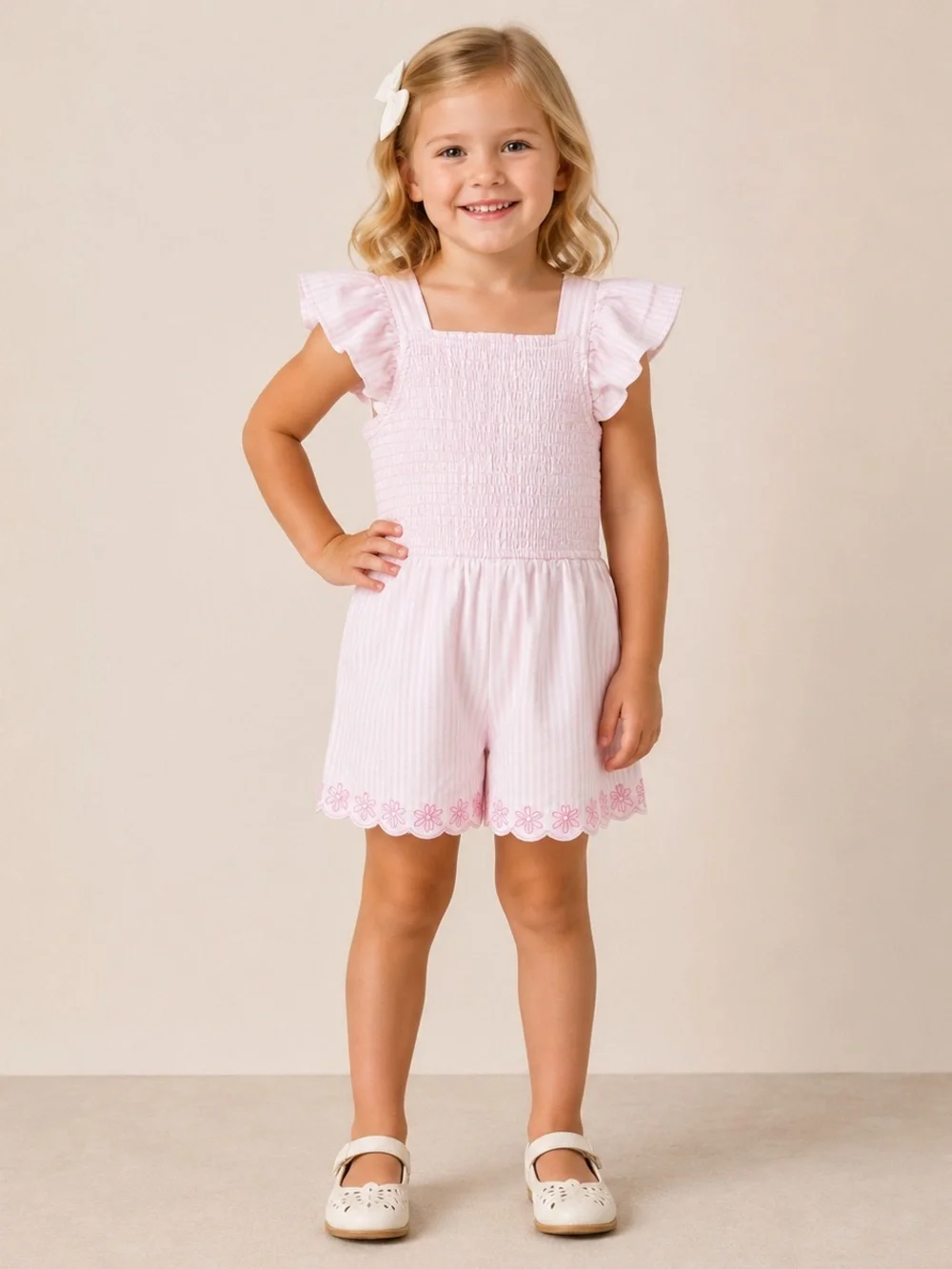 Draper James Light Pink Smocked Romper with Flutter Sleeves